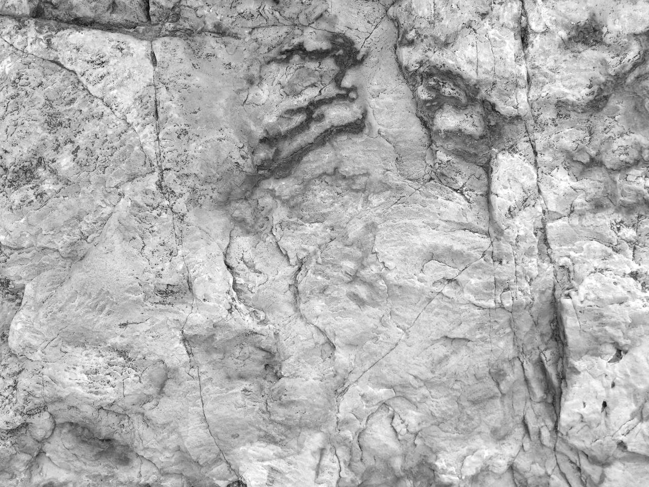 Sandstone with Rust Spots Texture   Free  — free black and white photo