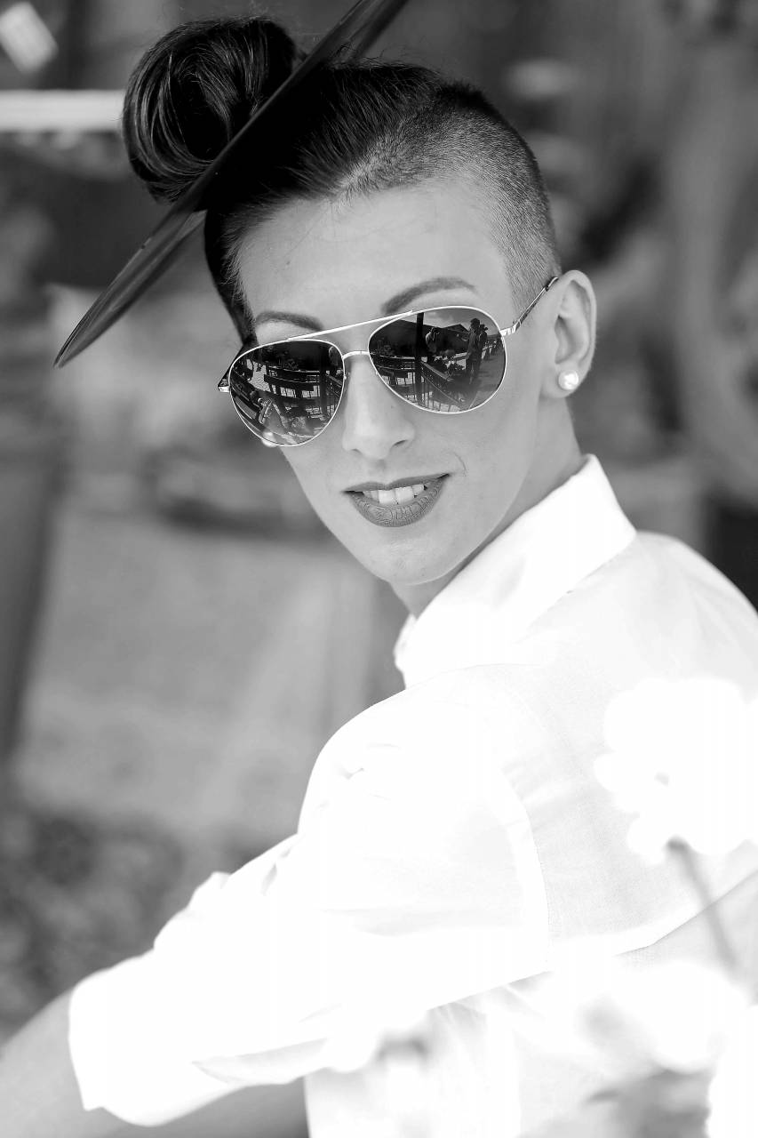 pretty vinyl sunglasses woman outdoors hairstyle gorgeous portrait person  — free black and white photo