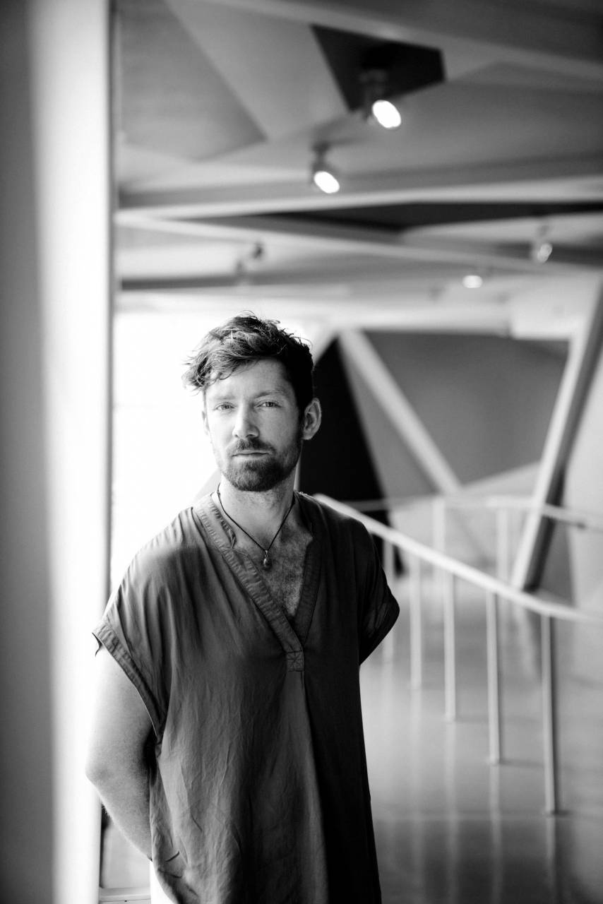 Man Posing in T-Shirt Free Stock Photo - NegativeSpace — free black and white photo