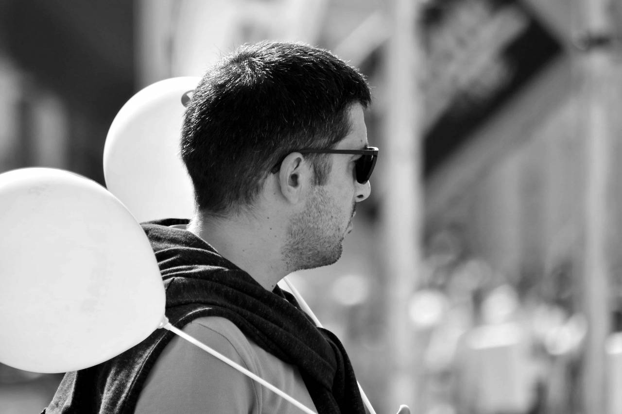 handsome beard balloon festival street confidence parade portrait mouth face kb binoculars  — free black and white photo