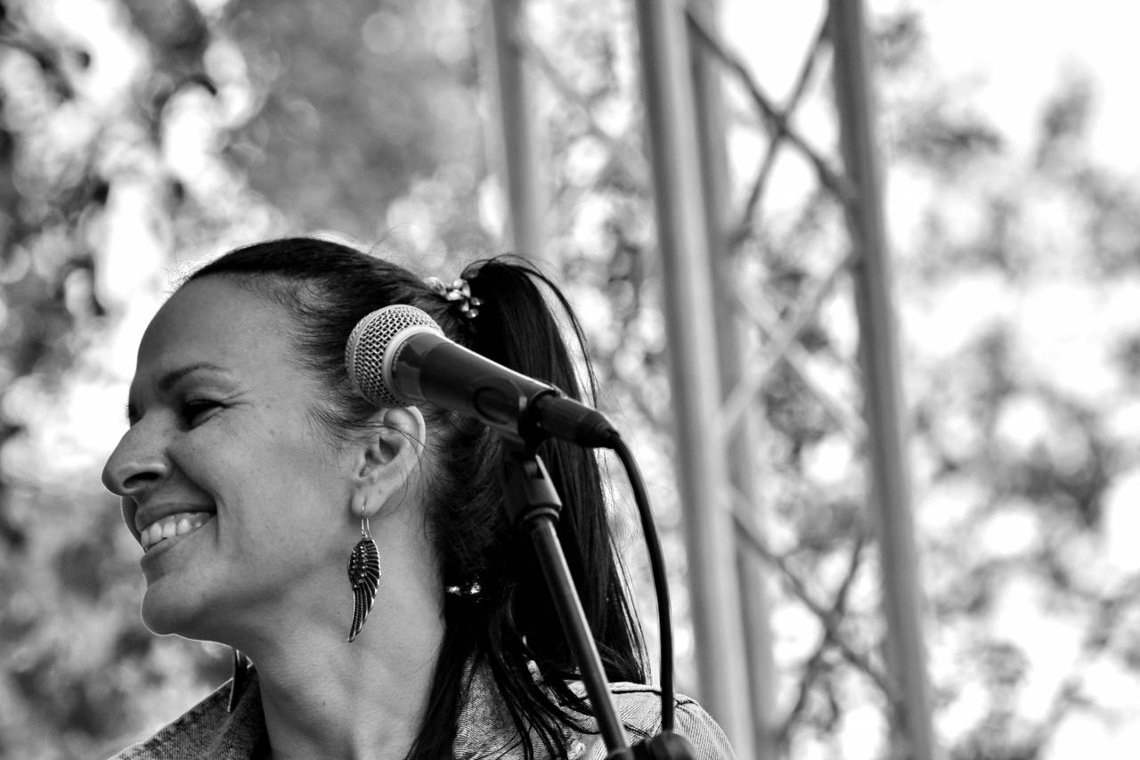 microphone entertainer singer concert portrait musician performance festival — free black and white photo