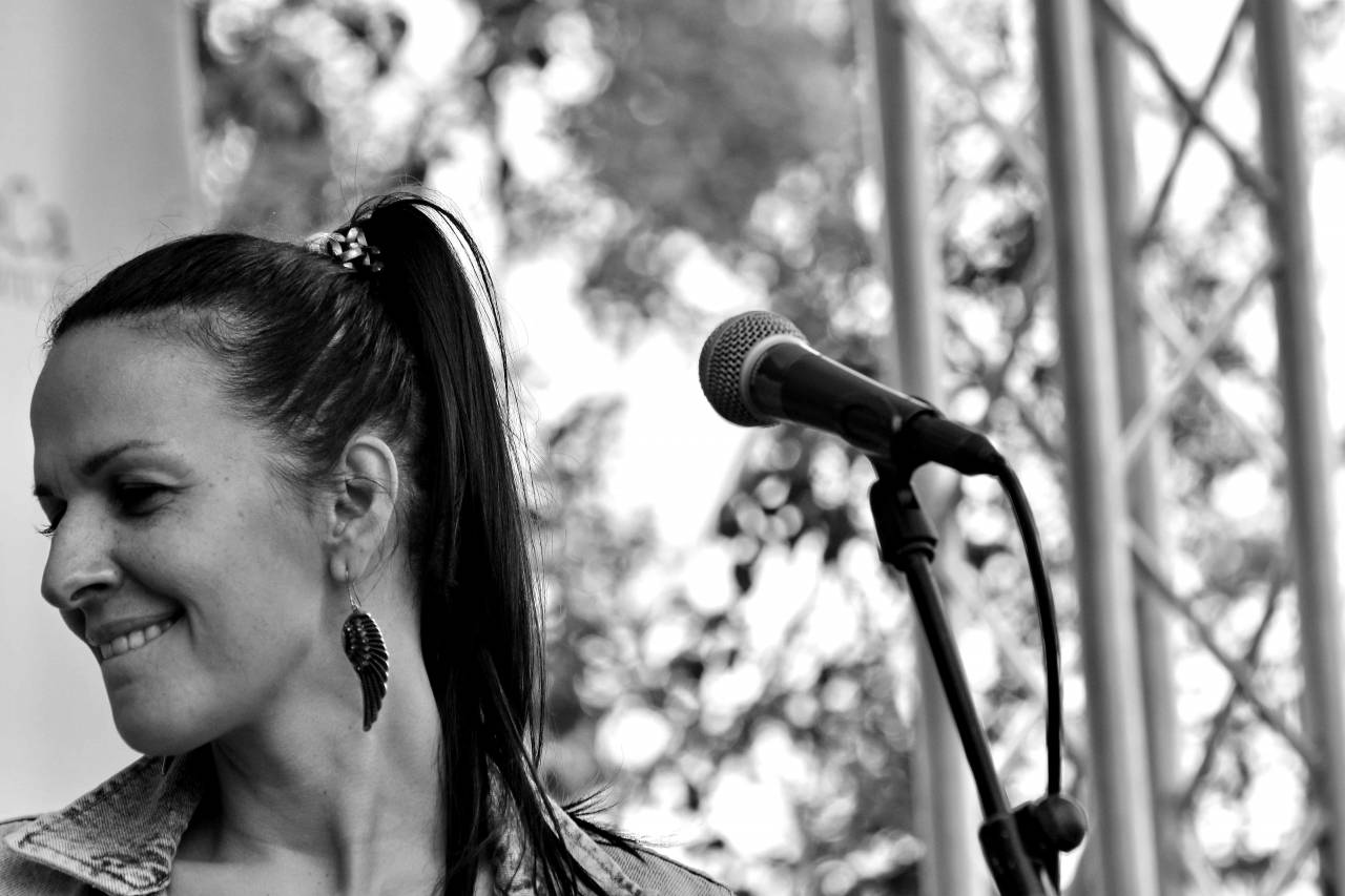 singing woman singer portrait enjoyment performer festival concert — free black and white photo