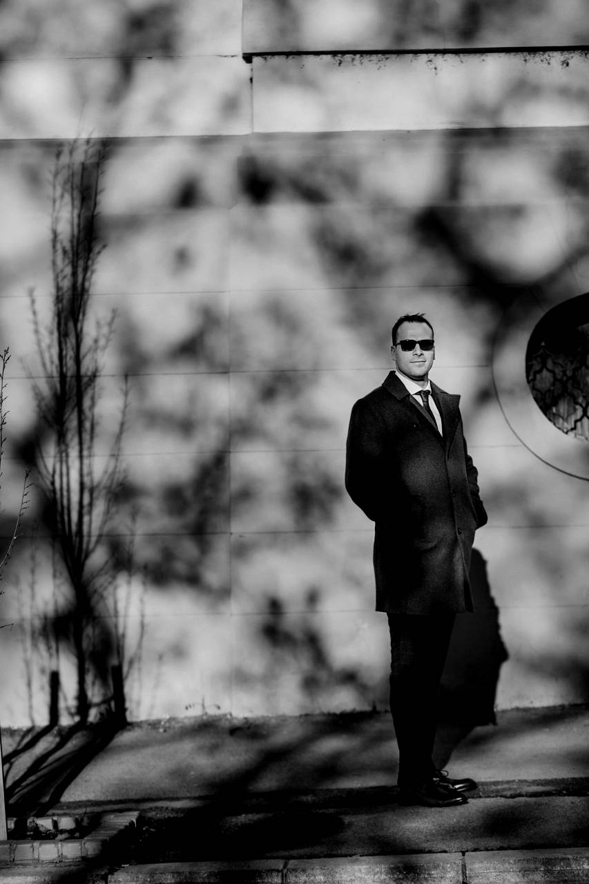 street couple outfit confident standing jacket portrait person  tuxedo businessman handsome suit — free black and white photo