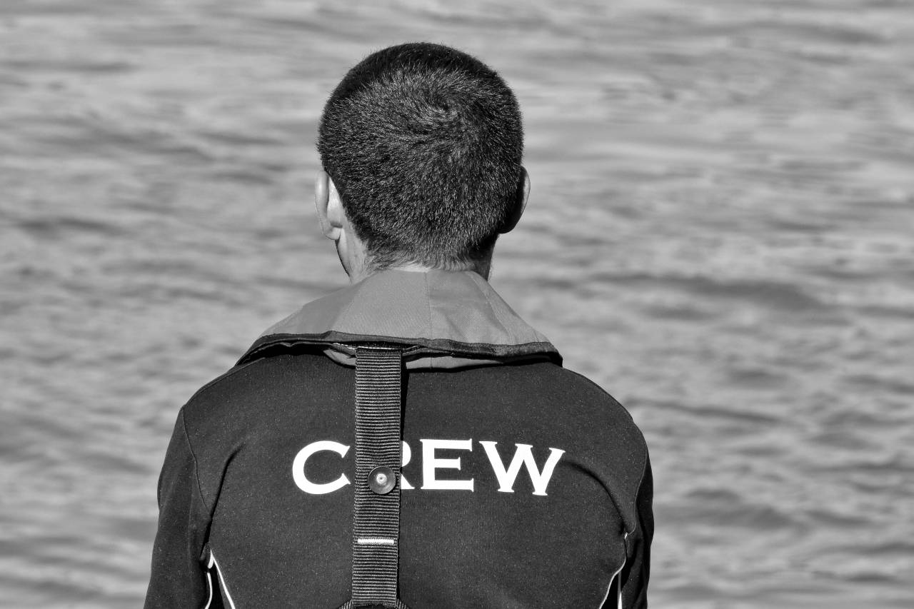 teamwork workman worker crew covering outdoors water clothing — free black and white photo