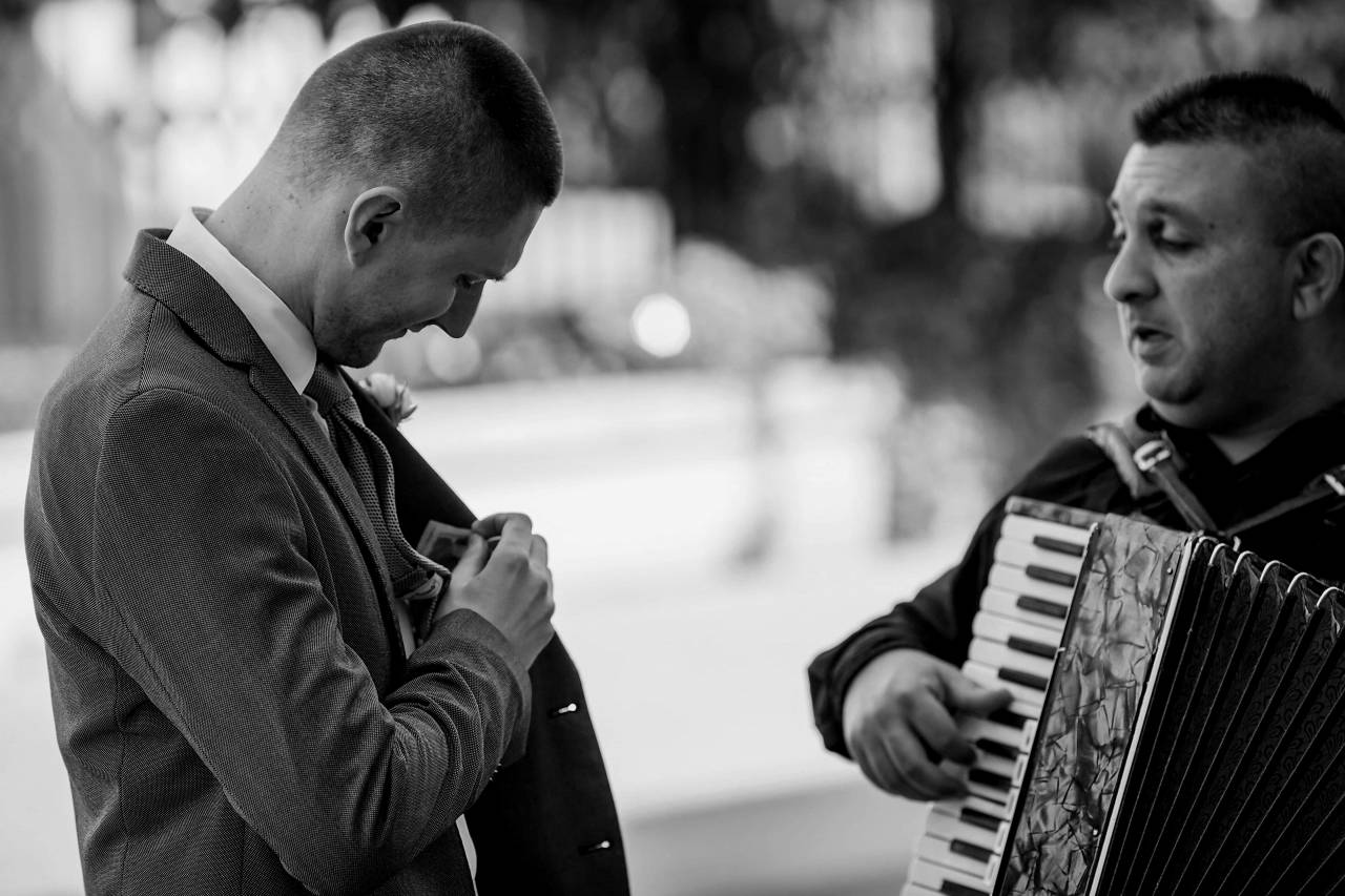 accordion entertainer musician cash singer customer money  — free black and white photo