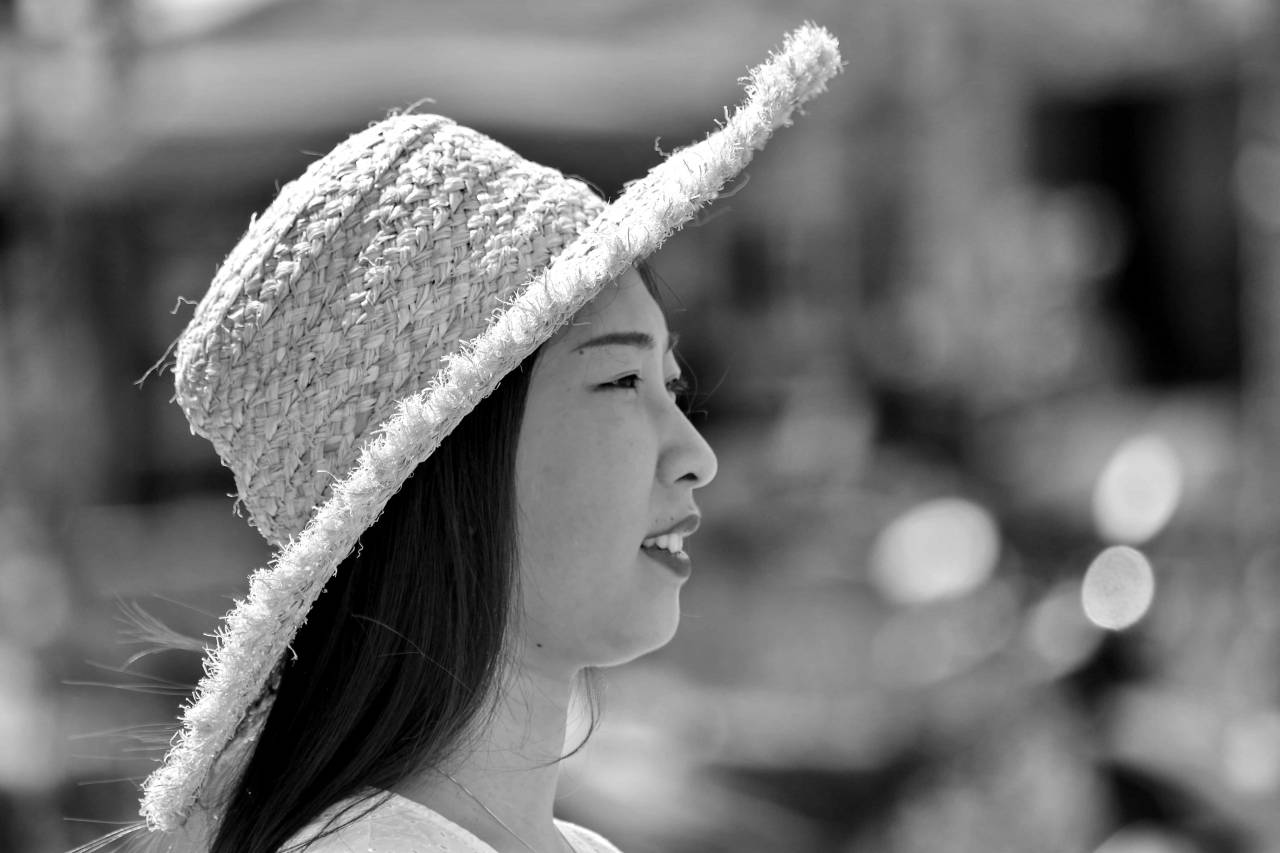 asian hat side hairstyle pretty portrait smile happiness gorgeous woman  grandmother eyeglasses pensioner outdoors summer — free black and white photo
