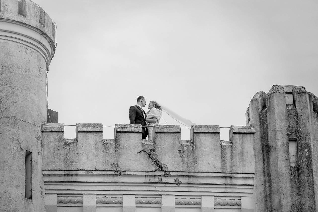 bride tower fortress groom castle wind outdoors architecture building  — free black and white photo