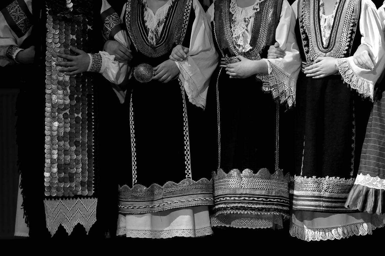 clothing fashioned folk traditional music outerwear vestment gown portrait  — free black and white photo