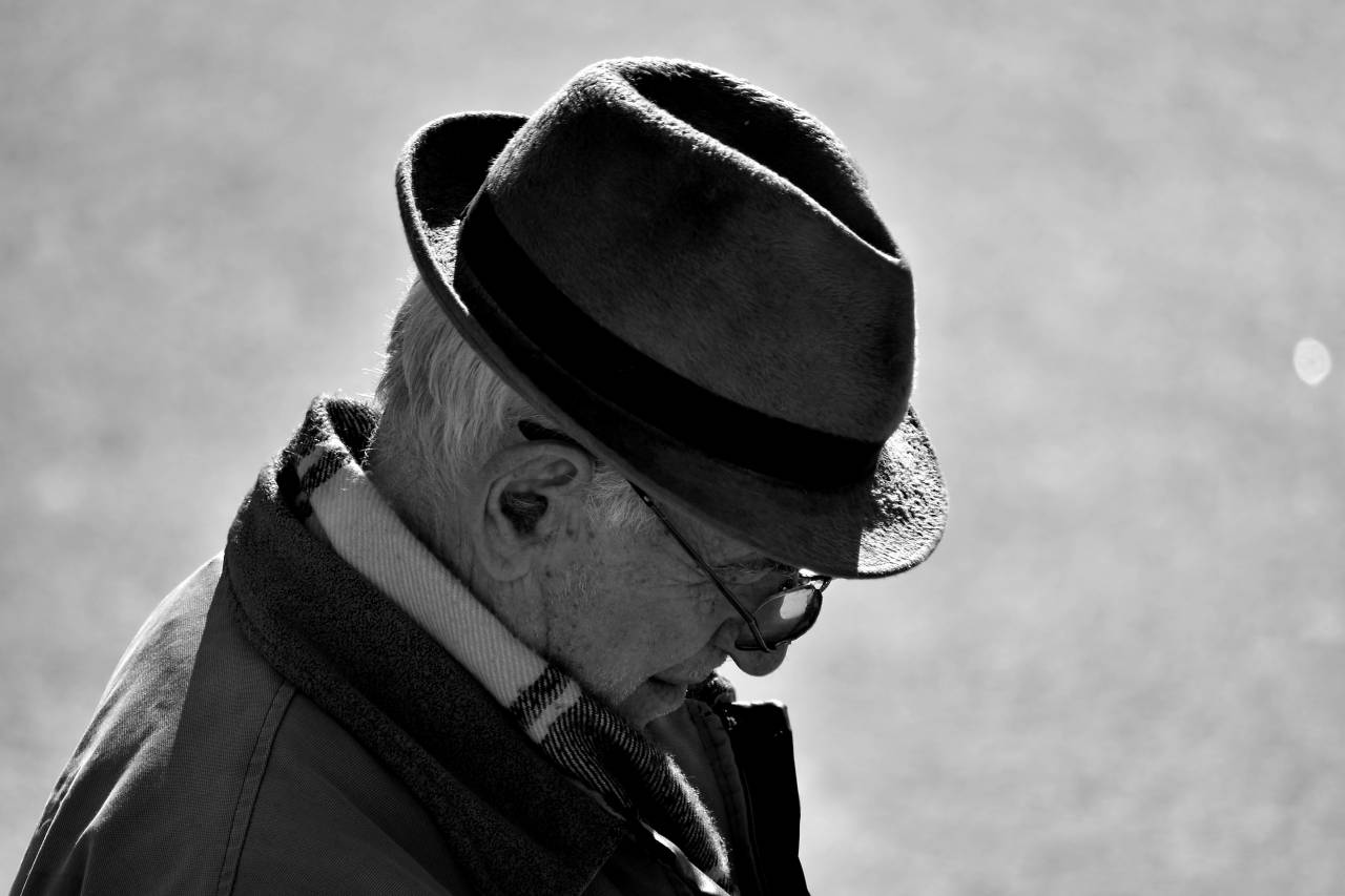 eyeglasses grandfather jacket hat face wrinkle serious clothing — free black and white photo
