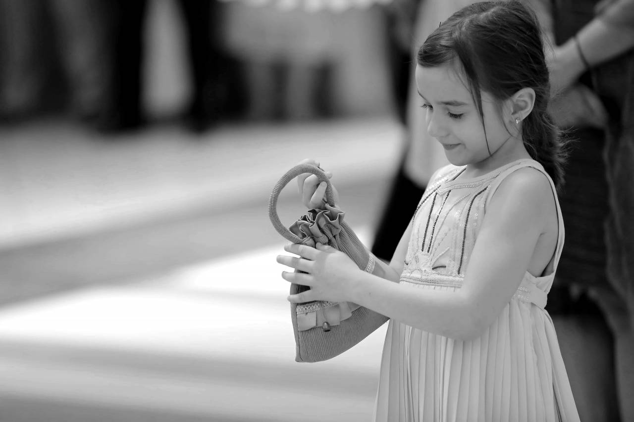 handbag accessory pretty dress indoors portrait child  — free black and white photo