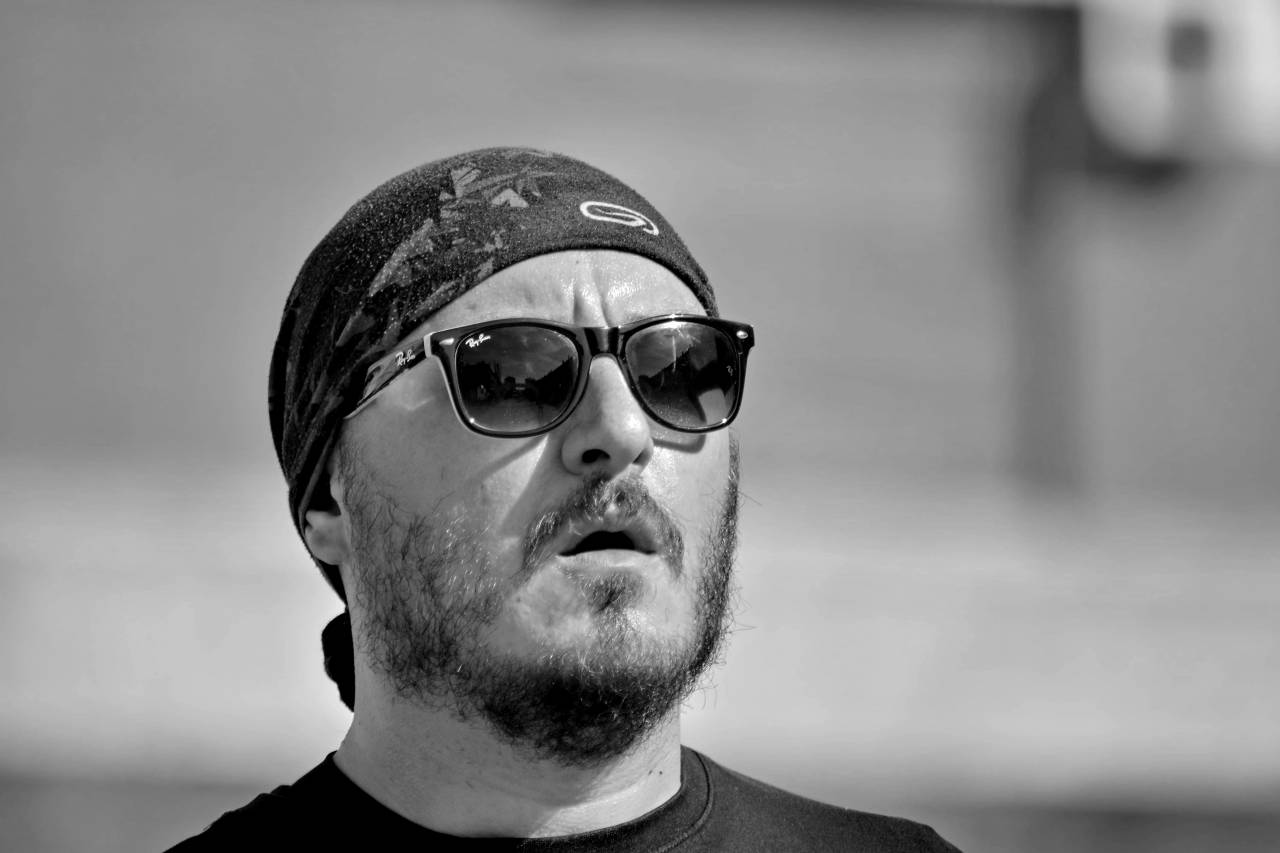 handsome face beard muscular mouth nose serious portrait  — free black and white photo