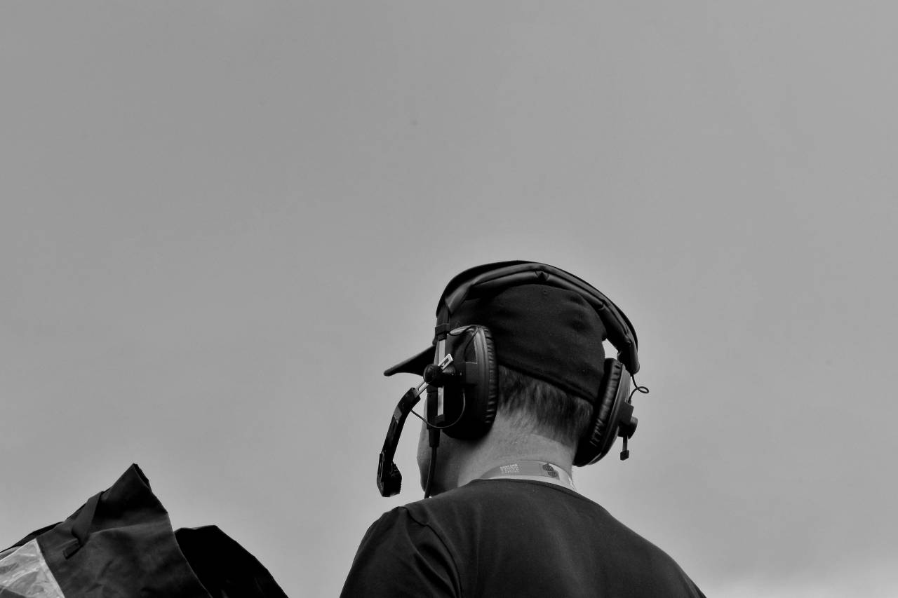 microphone side portrait nature recording television outdoors fun — free black and white photo