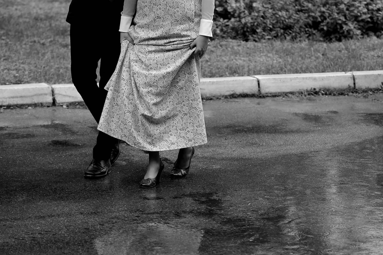 rain shoes wet dress walking suit woman portrait  — free black and white photo
