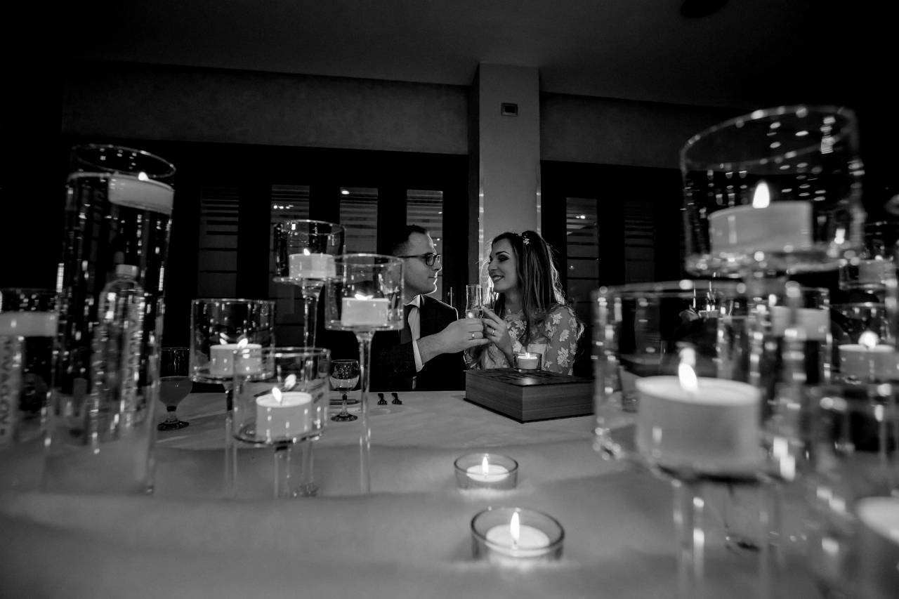 romantic candles dinner table nightclub champagne date wine restaurant  — free black and white photo