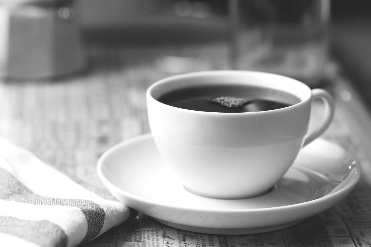 ?Black? Coffee in Cafe  — free black and white photo