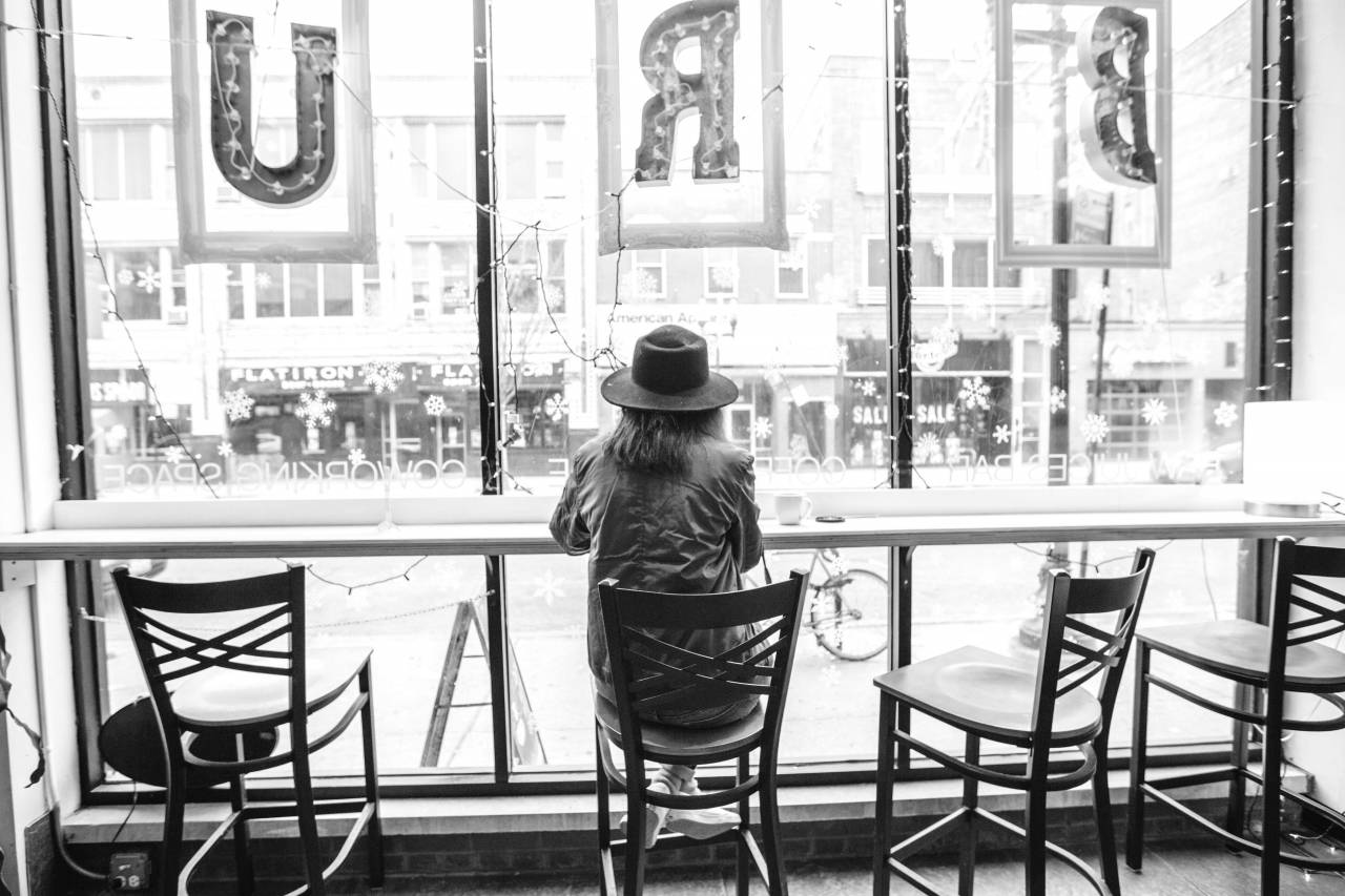 Woman Sitting at Window Coffee Shop Free Stock ?Photo? - ISO ... — free black and white photo