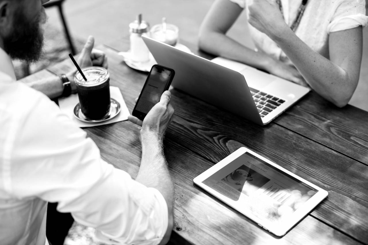 Desk, Mobile & Woman  — free black and white photo