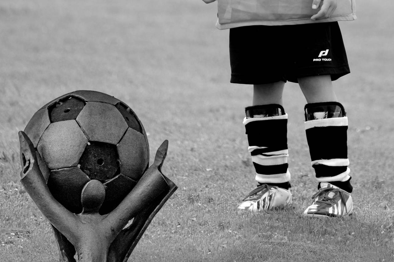   grass  sky  sport  lawn  play  feet  run  — free black and white photo