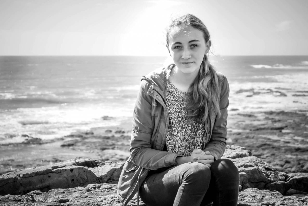   sea  rock  person  black and white  girl  — free black and white photo