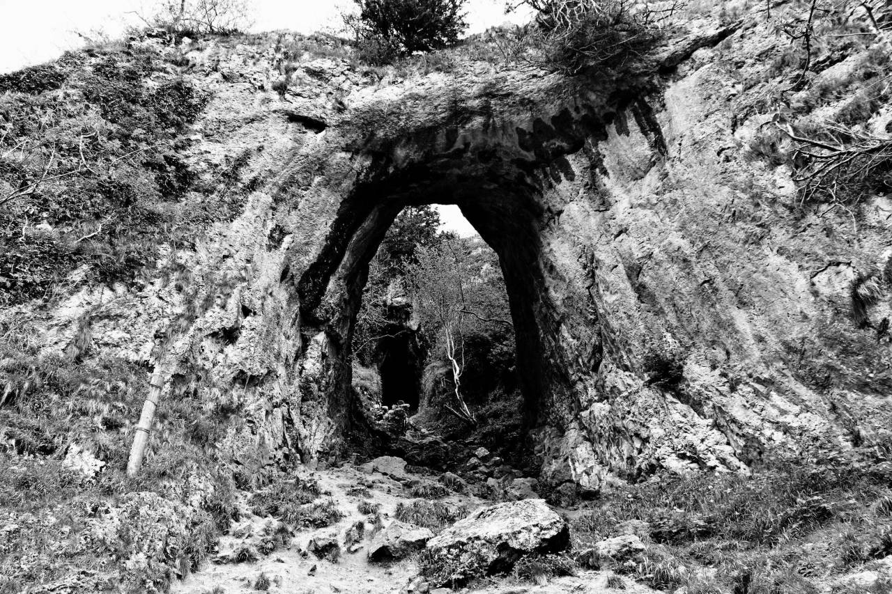   rock  hole  stone  formation  cave  geology  — free black and white photo
