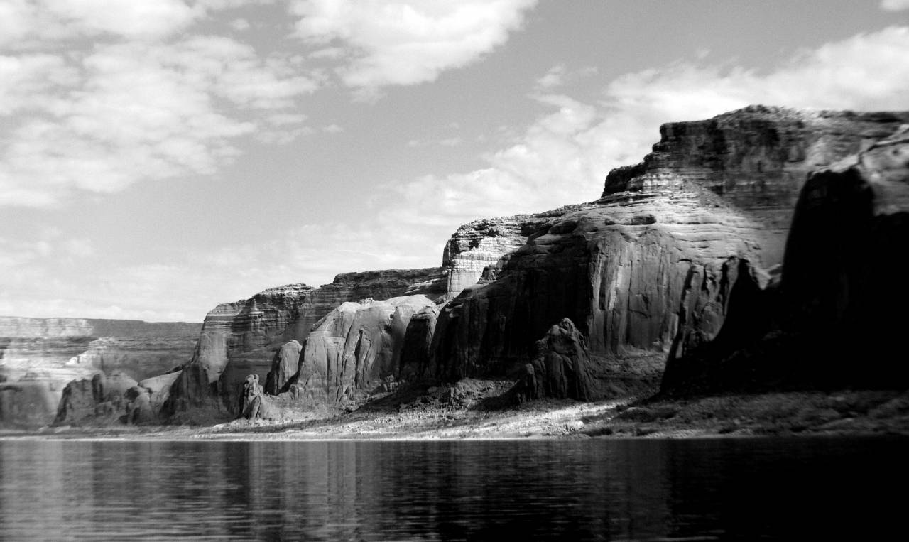   sea  coast  rock  formation  cliff  america  — free black and white photo