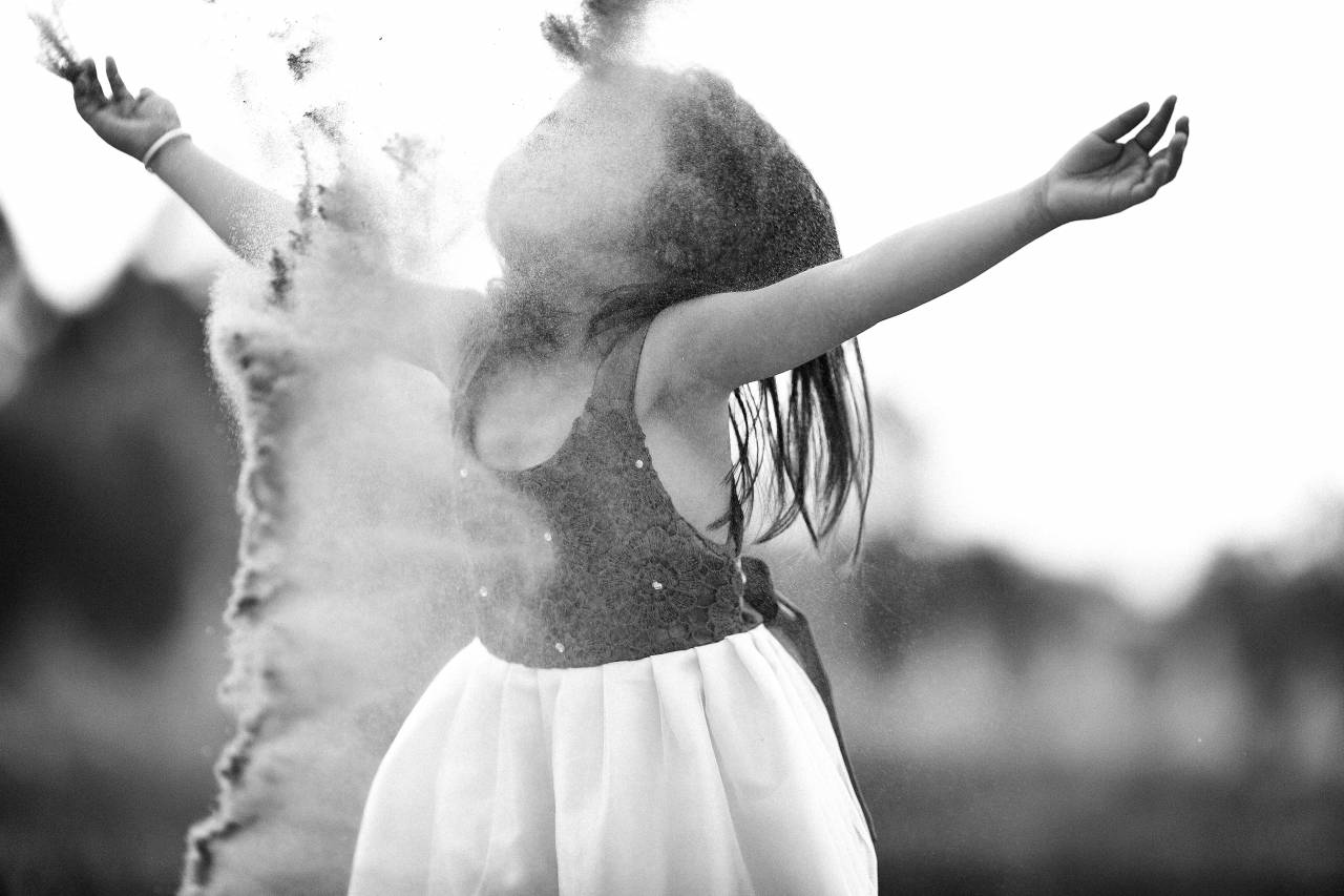 Child Playing in the Sand  — free black and white photo