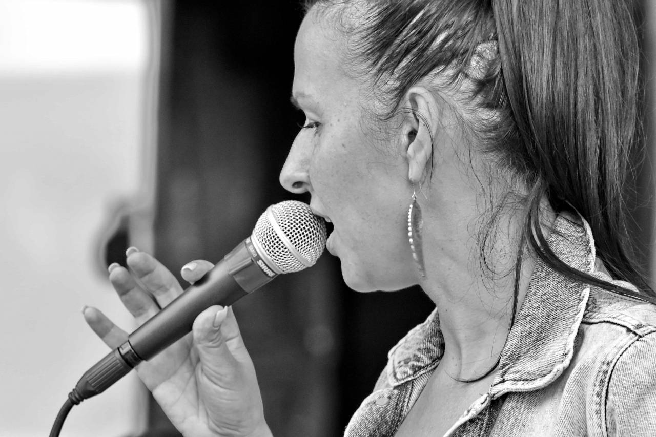 concert singing hall woman portrait singer performer musician person  — free black and white photo