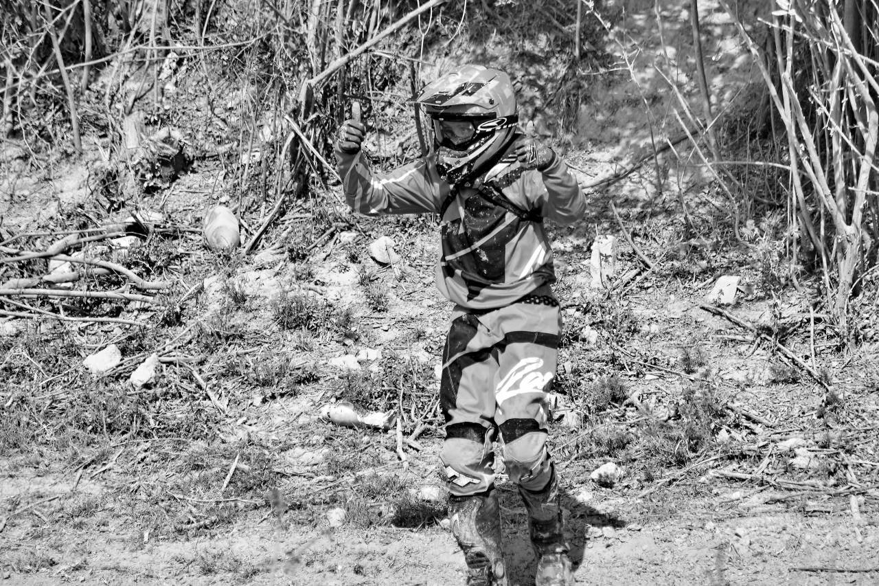 excitement motorcyclist motocross mud exhibition soil helmet adventure portrait man — free black and white photo