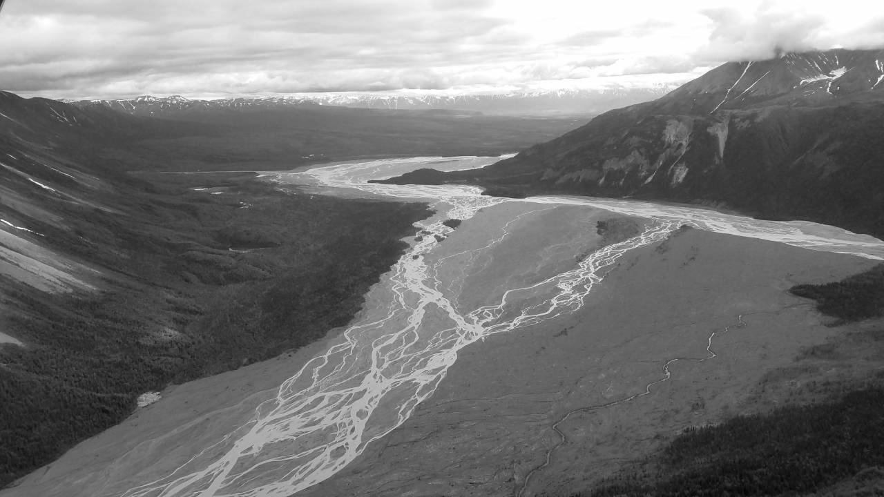 overlooking mountains altitude glacier range water mountain landscape snow nature  valley — free black and white photo