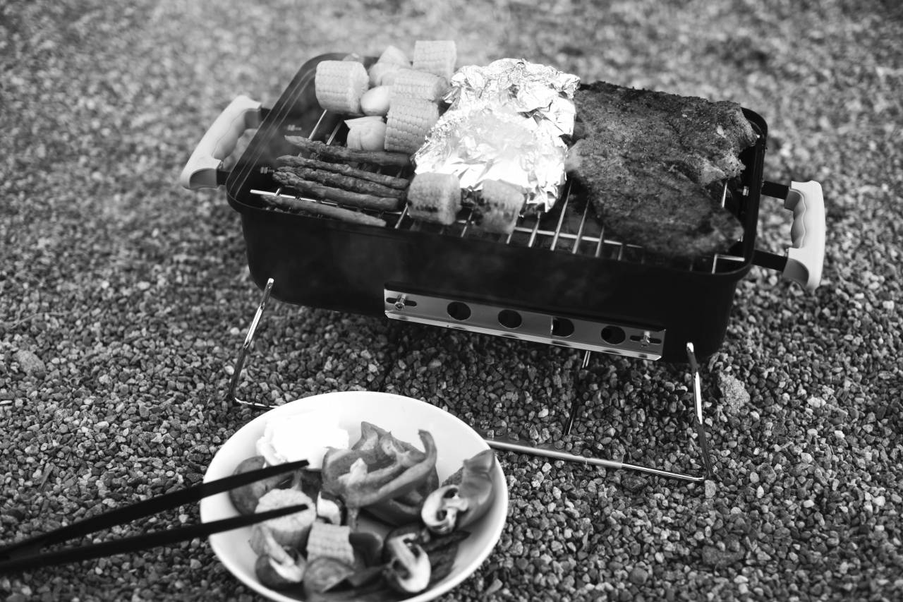 Preparing Barbecue  — free black and white photo