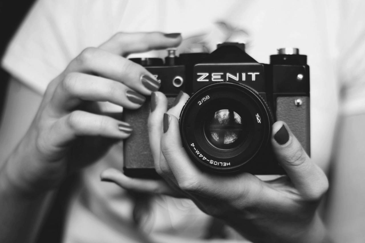 Woman Holding Retro Camera  — free black and white photo