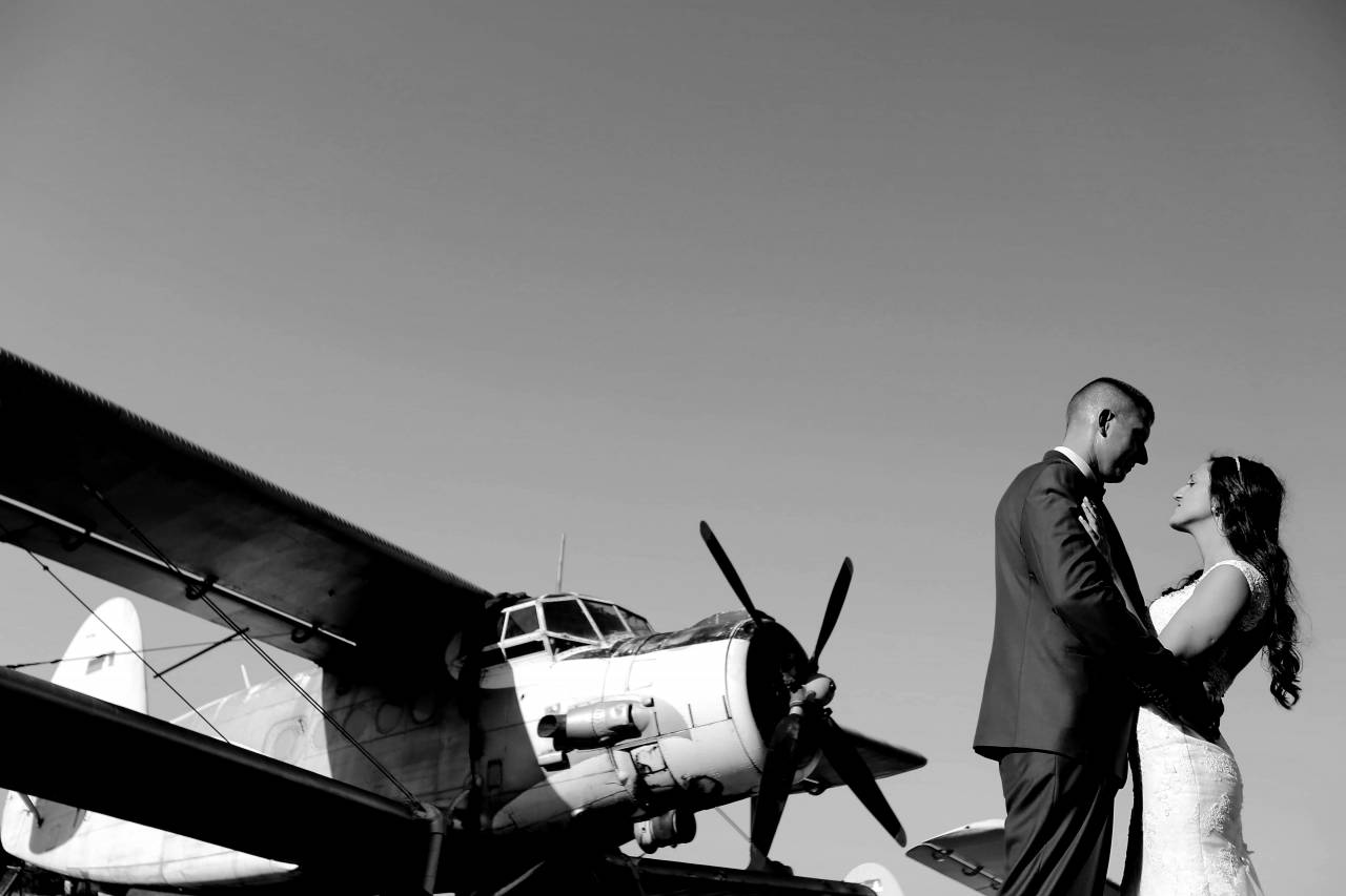 aircraft pilot wedding groom propeller bride engine biplane runway airplane  — free black and white photo