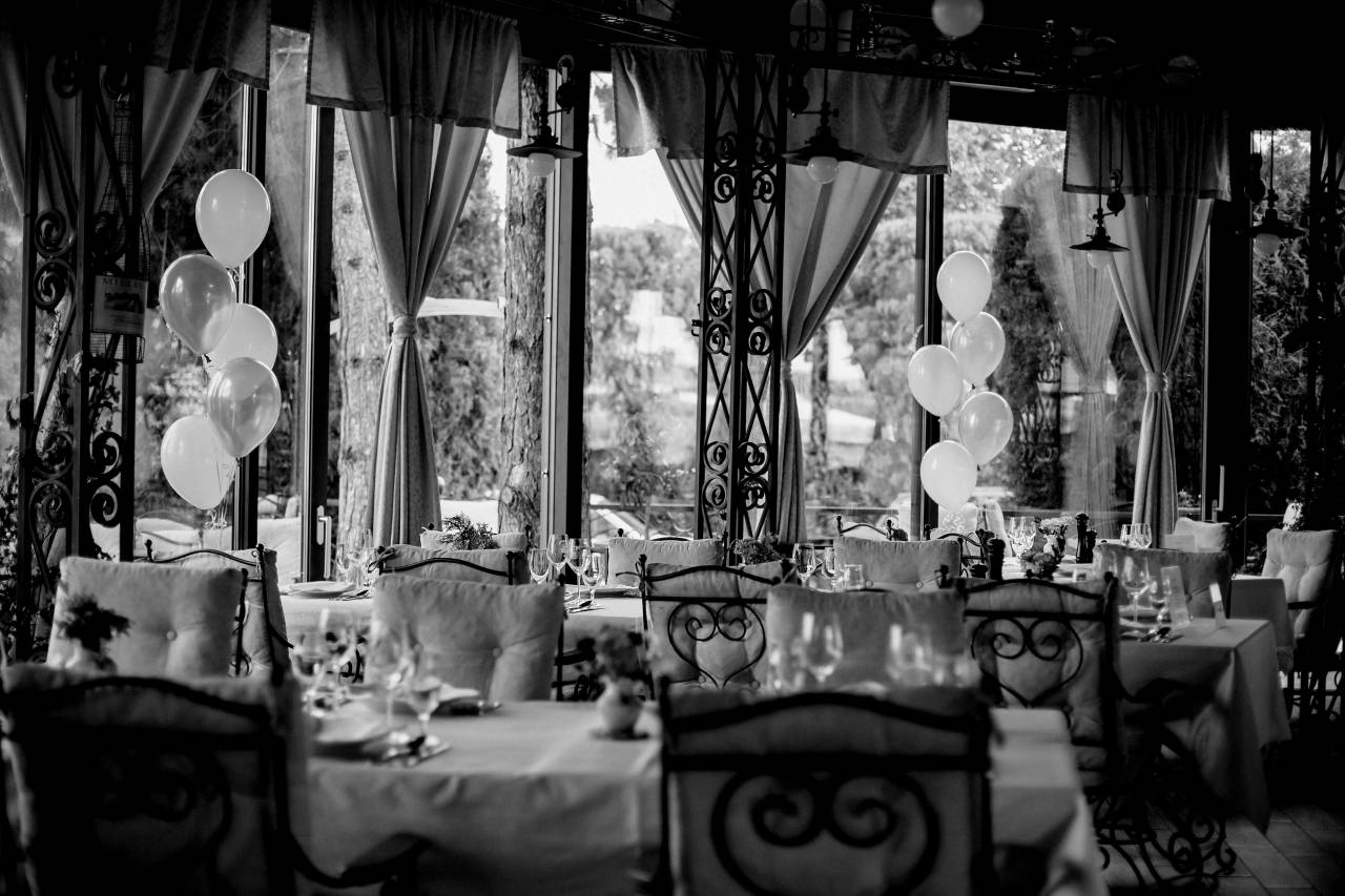 dining table balloon empty celebration restaurant area tableware chair furniture  — free black and white photo