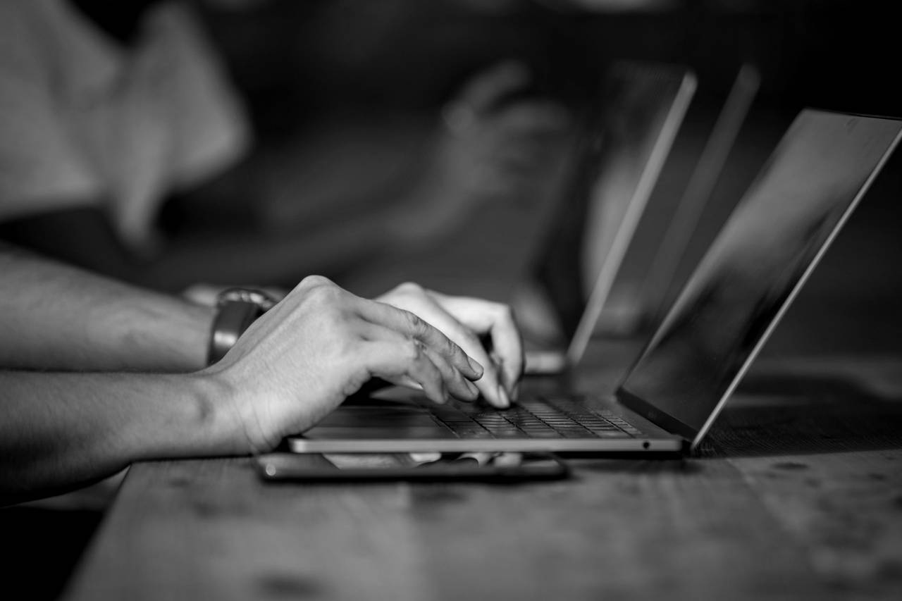 Laptop Working Close up  — free black and white photo