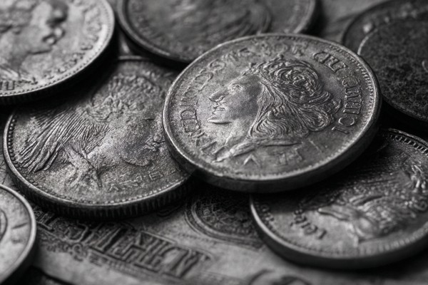 abstract composition of coins and paper money macro detail fo — black and white photo
