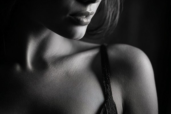 black and white boudoir picture close up of womans shoulder a — black and white photo