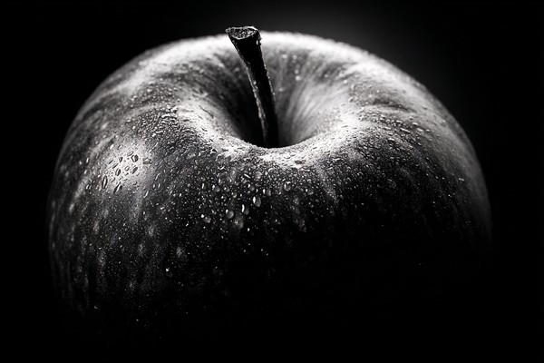 black and white picture of an apple extreme close up detailed — black and white food photo