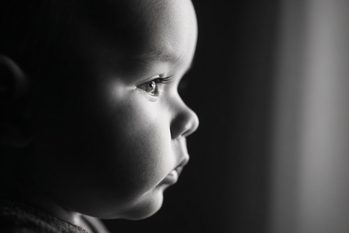 infant black and white picture soft window light from the sid — free black and white photo