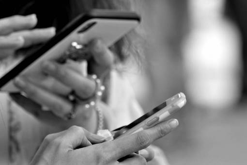 mobile phone hands touch woman development pitfalls telephone portrait pastorale giovanile esserci facts history phones dating  allnetarticles keep devices — black and white photo