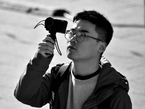 businessman photographer camera china face tourist attraction portrait
