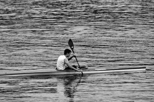 competition canoe oar river kayak water paddle athlete recreation canoeing  kayaking — black and white photo