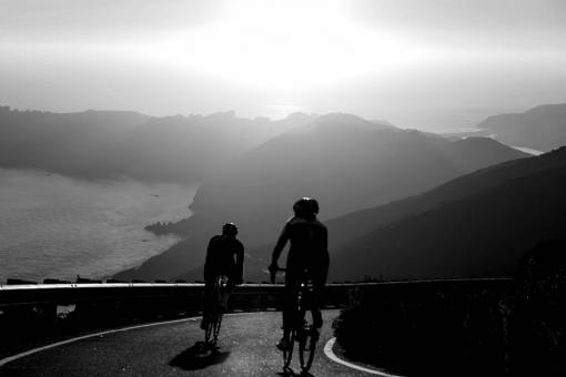 Men Cycling at Sunset Free Stock ?Photo? -  — black and white photo