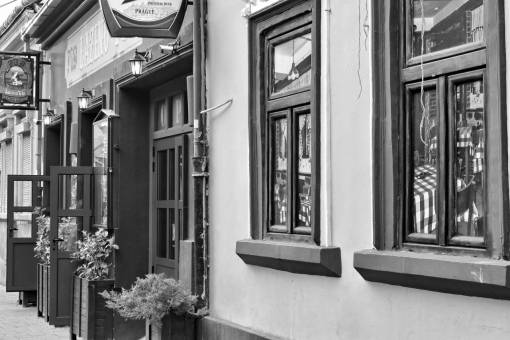 architecture sill door building facade traditional street outdoors — black and white photo