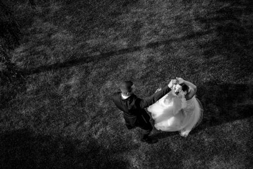 dancing waltz groom lawn grass bride dance wedding man  — black and white photo