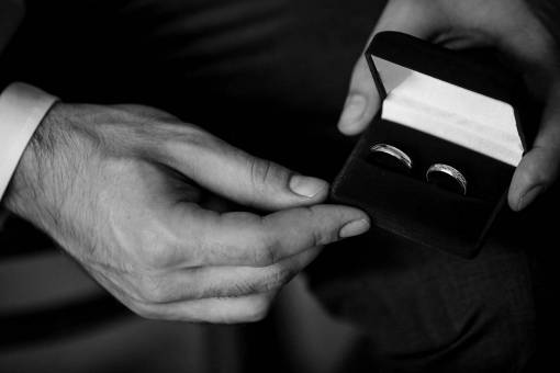 groom boyfriend ring gift rings hand — black and white photo